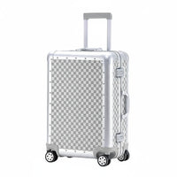 Silver checkered suitcase on a white background