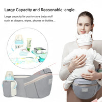 Baby carrier with attached pouch for baby care items, featuring a woman holding a baby.