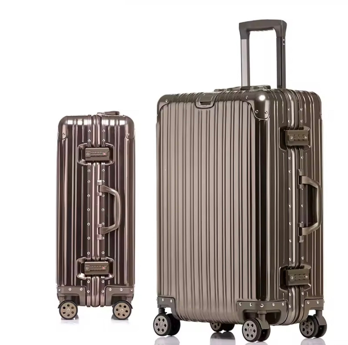 Two metallic suitcases on a white background