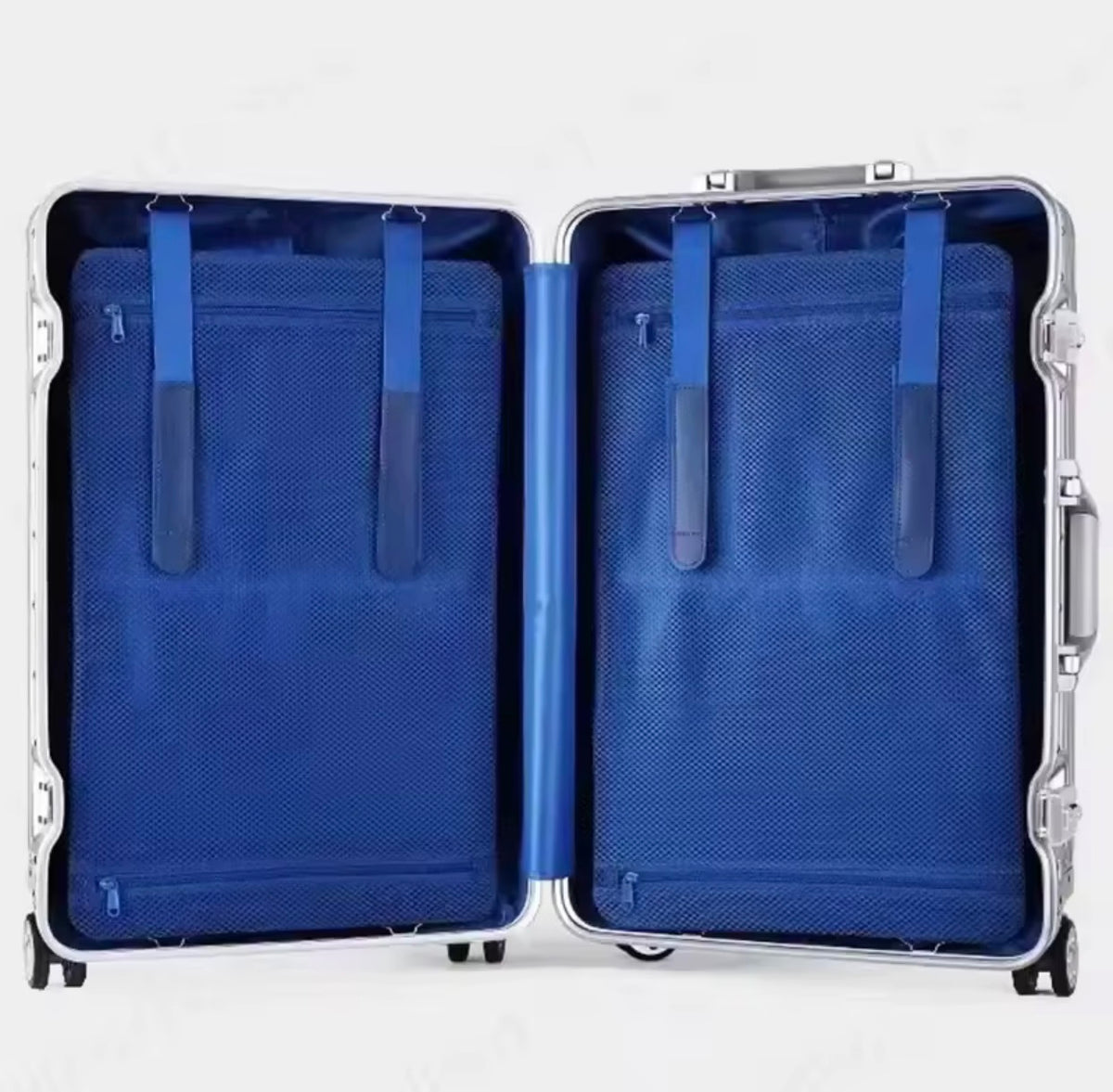 Open blue suitcase with blue interior on a white background