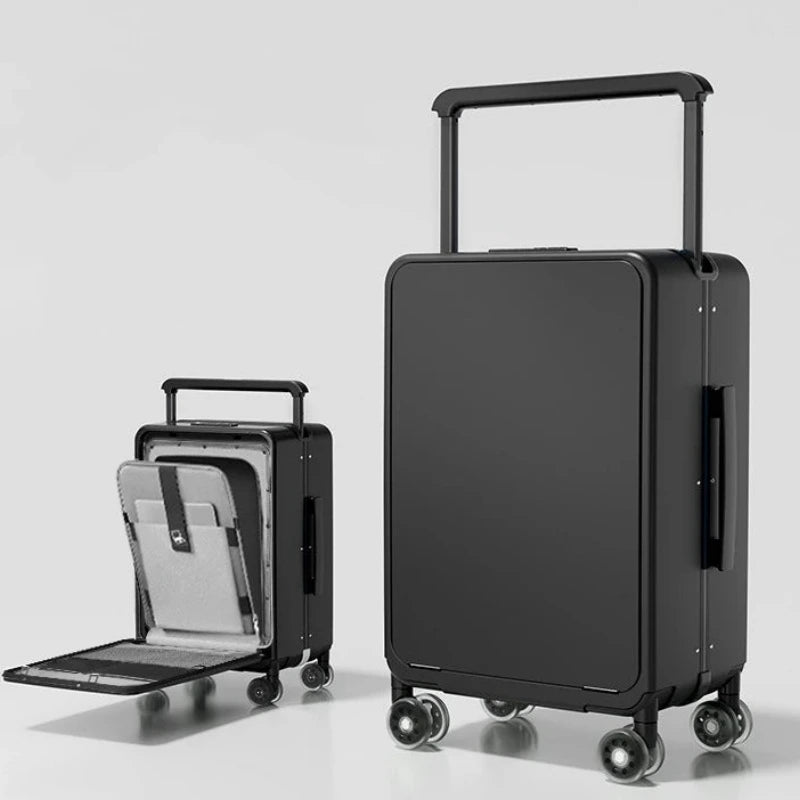 Black suitcase with a smaller black suitcase on wheels inside it, on a light gray background