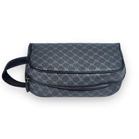 Gray toiletry bag with black handle on a white background