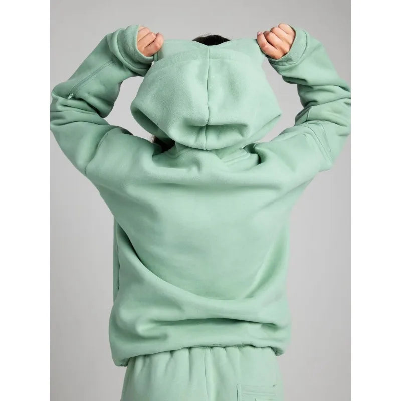 Light green hoodie with a plain background