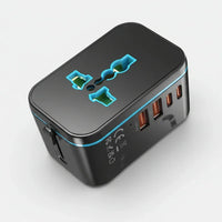 Black travel adapter with multiple ports on a white background