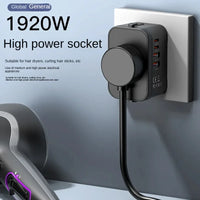 High power socket with multiple outlets and USB ports on a gray wall.