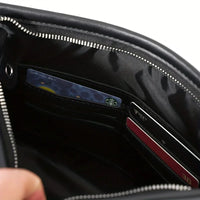 Black bag with visible brand logos on a white background