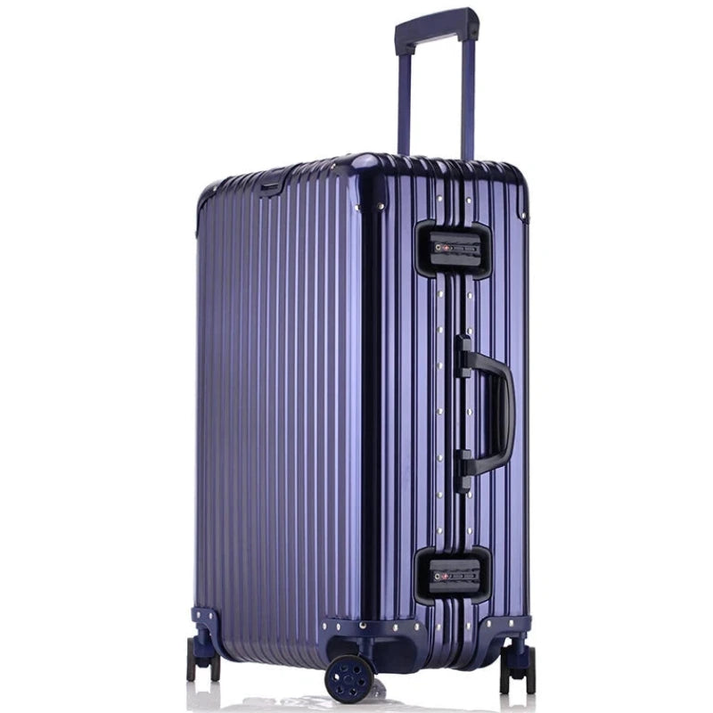 Purple suitcase with handle and wheels on a white background