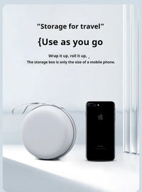 Small round white storage box next to a smartphone on a light gray background with text about travel storage.