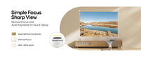 Projector displaying a scenic landscape with text on manual focus and auto keystone correction.