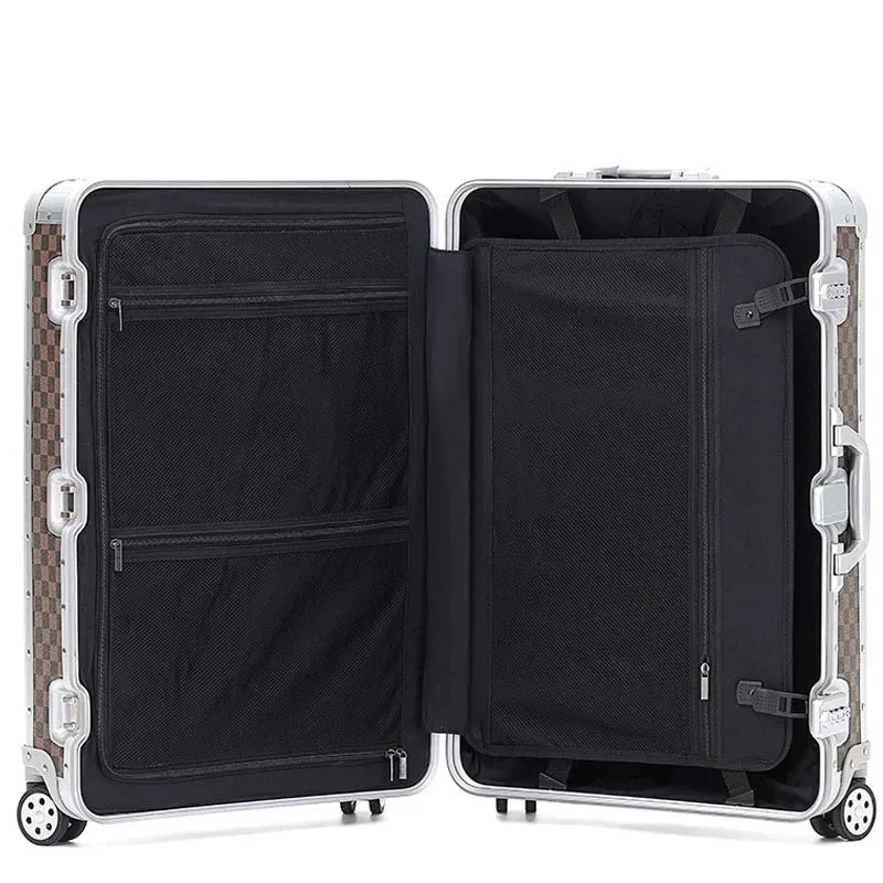 Interior view of the Monarch premium aluminum suitcase in Heritage Bronze, showcasing executive lining and organizational panels, curated by AERIA Prestige.